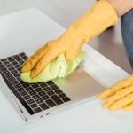 How to Clean Your Laptop from Oil and Stains