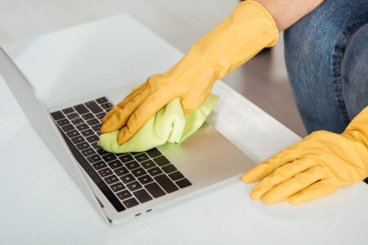 How to Clean Your Laptop from Oil and Stains